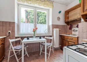 Kuchnia lub aneks kuchenny w obiekcie Mieszkanie Next - ACCO RENT