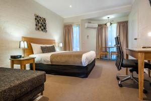 Katil atau katil-katil dalam bilik di Comfort Inn Coach & Bushmans
