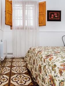 Säng eller sängar i ett rum på Casa rural la ermita de Anna