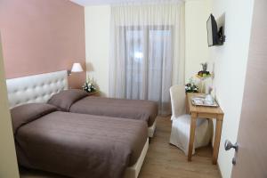 TV a/nebo společenská místnost v ubytování Maison Reale