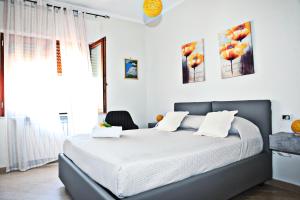 Postel nebo postele na pokoji v ubytování Mura Home Sorrento