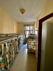 Posteľ alebo postele v izbe v ubytovaní Ametyst Apartments