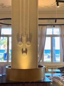 Postel nebo postele na pokoji v ubytování Lolli Palace Hotel