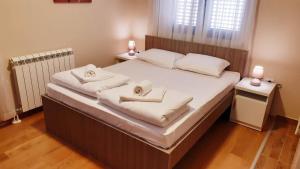 Letto o letti in una camera di Pilon apartments