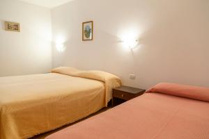 Postel nebo postele na pokoji v ubytování Rooms Anka
