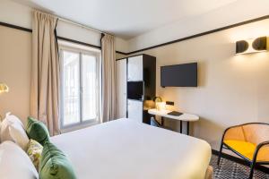 TV a/nebo společenská místnost v ubytování Best Western Premier Hotel Roosevelt
