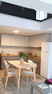 Η κουζίνα ή μικρή κουζίνα στο Cattleya's Loft