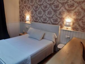 Кровать или кровати в номере Hotel Marisma Sancti Petri
