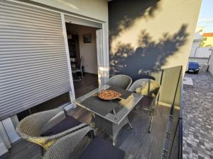 Posedenie v ubytovaní Apartmani Eden Vrsi Mulo