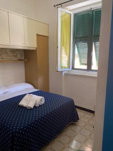 Letto o letti in una camera di Caravella
