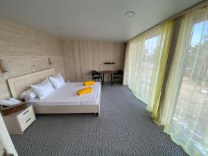Кровать или кровати в номере Villa Malina Olkhon Baikal