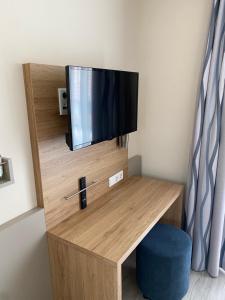 TV a/nebo společenská místnost v ubytování Hotel Rosenbusch