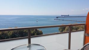 a view of the ocean from a balcony at Hotel Flisvos in Kalamata