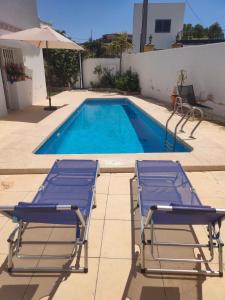 The swimming pool at or close to Apartamento vistas al mar - Coveta Fuma