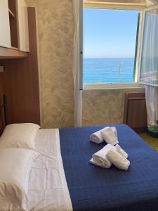 Letto o letti in una camera di Caravella