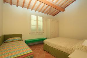 Postel nebo postele na pokoji v ubytování Agriturismo Campallegro + 37 fotografií