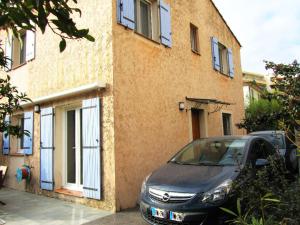 a car parked in front of a building at Cosy Room in the centre in Saint-Laurent-du-Var