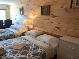 Postel nebo postele na pokoji v ubytování The Coastal Cabins in New Brunswick