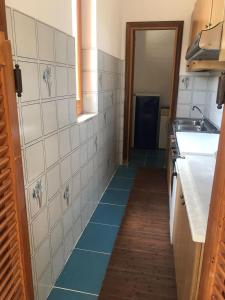Η κουζίνα ή μικρή κουζίνα στο Casa Vacanze Palinuro Trivento