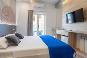 Postel nebo postele na pokoji v ubytování Apartments Jakic