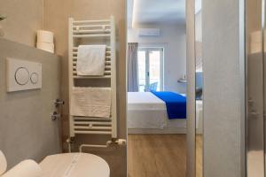 Postel nebo postele na pokoji v ubytování Apartments Jakic