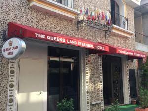 a building with a sign for the queens land jewish hotel at Hotel Queens Land in Istanbul +25 photos