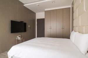 Postel nebo postele na pokoji v ubytování Whoops Hotel