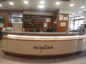 a bar with the name negretti on it in a restaurant at Hotel Residence Memmina in Frosinone
