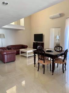 TV a/nebo společenská místnost v ubytování Santa Lucia B&B