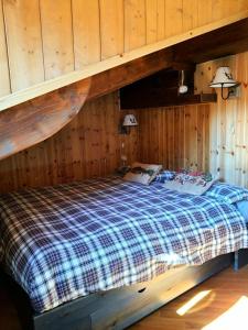 Llit o llits en una habitació de Maison des Alpes #Bluchalet