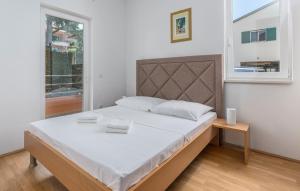 Postel nebo postele na pokoji v ubytování Apartment Raul in Dajla