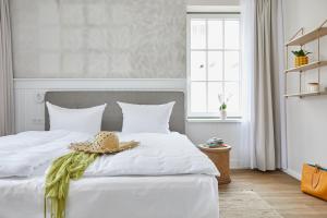 Un pat sau paturi într-o cameră la Villa Fortuna