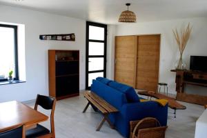 Posezení v ubytování La Maison Volganza - Gîte à la ferme dans le Perche