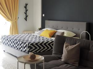 Katil atau katil-katil dalam bilik di Aeropod Sovo Studio - Laxzone Suite