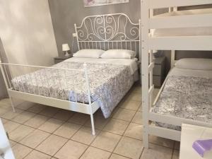 Postel nebo postele na pokoji v ubytování B&B A Casa di Lilla
