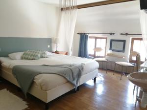 Postel nebo postele na pokoji v ubytování Guesthouse La maison de Fille