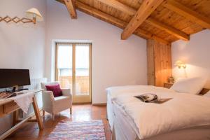 Una cama o camas en una habitación de B&B Cecilia