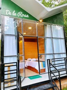 a small house with a bed inside of it at Homestay De la Rosa - Côn Đảo in Con Dao