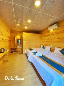 Llit o llits en una habitació de Homestay De la Rosa - Côn Đảo