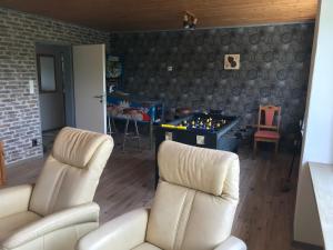 Posezení v ubytování Biker's Base Baddeckenstedt