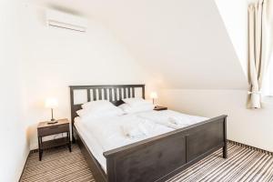 Posteľ alebo postele v izbe v ubytovaní Penzion Platan + 20 fotografií