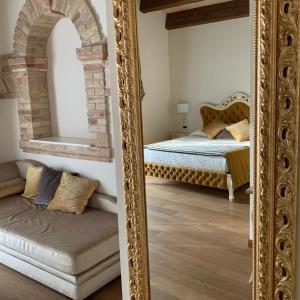 Postel nebo postele na pokoji v ubytování Agriturismo De Luca