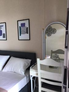 Ένα ή περισσότερα κρεβάτια σε δωμάτιο στο Seaside apartment