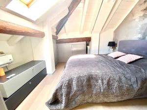 a bedroom with a large bed in a attic at ABCdecor Italia in Imperia