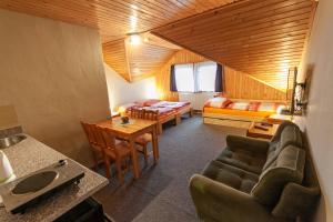 A bed or beds in a room at LEVIAL Rooms