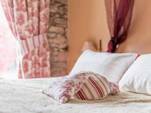 Posteľ alebo postele v izbe v ubytovaní Chambres d'hôtes - Au Domaine des Camélias