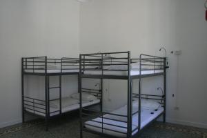 Posteľ alebo postele v izbe v ubytovaní Urban Oasis Hostel