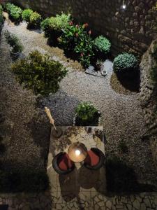 an overhead view of a garden with potted plants at Apartments Corner in Dubrovnik