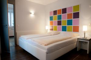 Postel nebo postele na pokoji v ubytování Altstadt Hotel Baunachshof