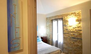 Postel nebo postele na pokoji v ubytování Cabanè Bed and Breakfast